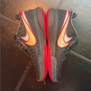 Nike LeBron 20 "Trinity" sneakers in a black and university red colorway Miami